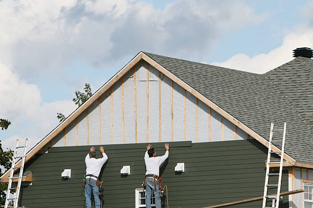 Professional Emergency Siding Repair technician working in Hubbard, OH